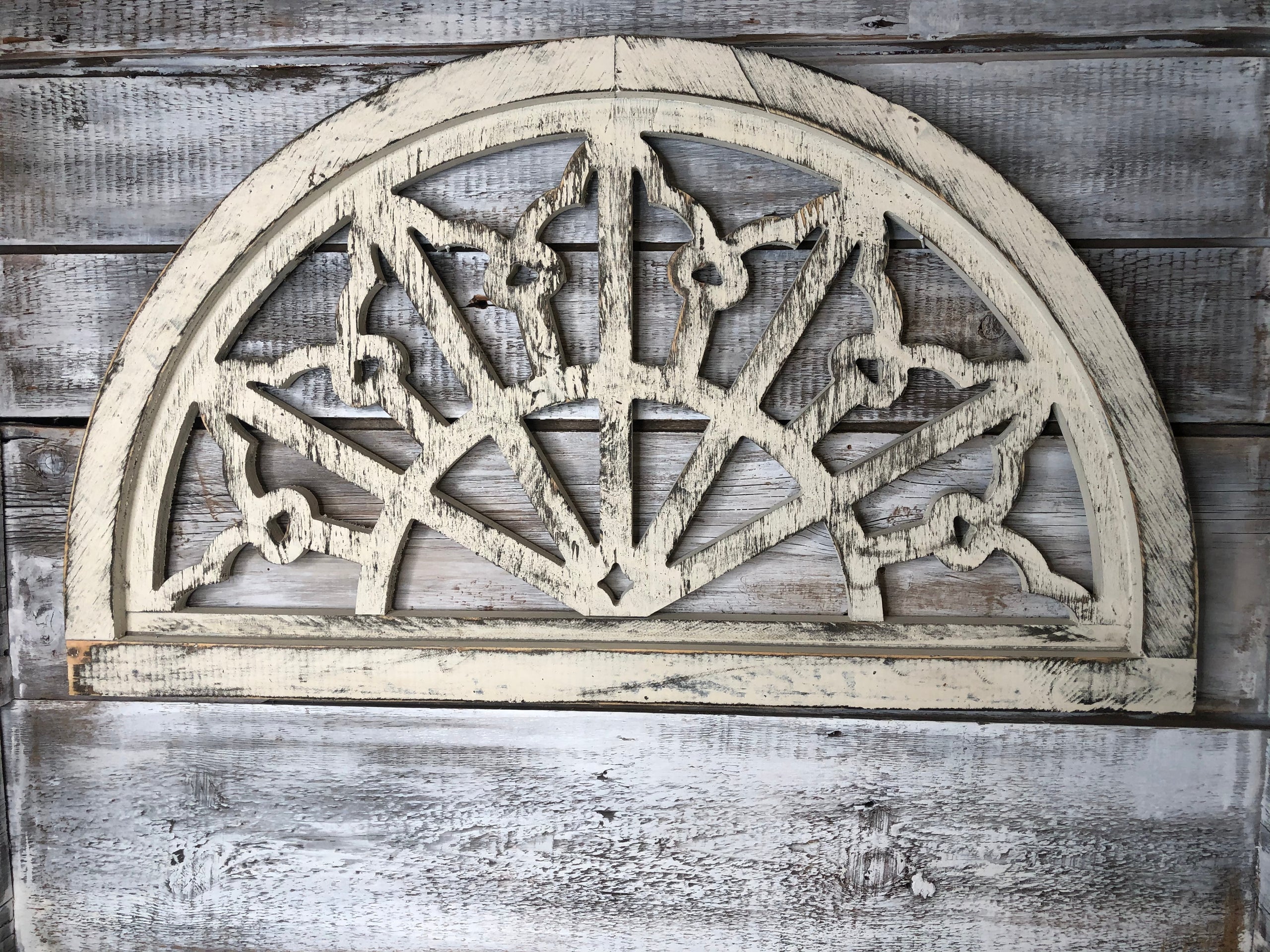 Wood recreated architecture piece called Palladian arch windows at